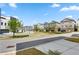 Scenic street view showcases a neighborhood with well-manicured lawns, mature trees, and appealing townhomes at 914 Martin Nw St, Atlanta, GA 30318