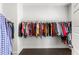 Spacious walk-in closet featuring ample hanging space for clothing and accessories at 914 Martin Nw St, Atlanta, GA 30318