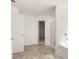 Bathroom featuring tile floors, bathtub, shower with glass door, and toilet at 12105 Conrad Cir, Hampton, GA 30228