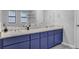Bathroom vanity with double sinks and large mirror offering a bright space at 2775 Whippoorwill Cir, Duluth, GA 30097