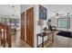 Home entryway with hardwood floors, stylish decor, and a view into the living room and kitchen at 2775 Whippoorwill Cir, Duluth, GA 30097