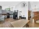 Kitchen with hardwood floors, island with seating, and modern appliances at 2775 Whippoorwill Cir, Duluth, GA 30097