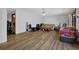 Spacious living room with hardwood floors and ceiling fan at 2775 Whippoorwill Cir, Duluth, GA 30097