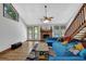 Living room features stone fireplace, hardwood floors, and plenty of space for entertaining and relaxing at 2775 Whippoorwill Cir, Duluth, GA 30097