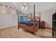 Spacious primary bedroom with a ceiling fan, hardwood floors, and natural light at 2775 Whippoorwill Cir, Duluth, GA 30097