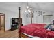 Main bedroom featuring hardwood floors, a ceiling fan, and bright natural light at 2775 Whippoorwill Cir, Duluth, GA 30097