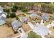 Aerial view of homes showcasing well-maintained yards, mature trees, and a Gathering friendly cul-de-sac at 552 Lawton Bridge Sw Rd, Smyrna, GA 30082