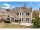 Beautiful backyard featuring a well-maintained lawn, patio, and pergola perfect for outdoor relaxation at 552 Lawton Bridge Sw Rd, Smyrna, GA 30082