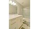 Bathroom showcasing a tub and shower, a modern vanity, and sleek fixtures at 4095 Stillwater Dr, Duluth, GA 30096
