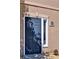 Stylish navy blue front door framed with brick and white trim, adding curb appeal to the home at 4095 Stillwater Dr, Duluth, GA 30096