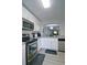 This updated kitchen features stainless steel appliances and granite countertops at 4095 Stillwater Dr, Duluth, GA 30096