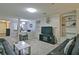 An open-concept living room leads to a dining room and features built-in bookshelves at 4095 Stillwater Dr, Duluth, GA 30096