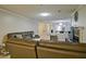 Open-concept living room with fireplace and view to the kitchen area at 4095 Stillwater Dr, Duluth, GA 30096