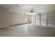 Spacious garage with modern doors and bright lighting at 612 Windcroft Nw Cir, Acworth, GA 30101
