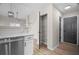 Stylish kitchen features granite countertops, stainless steel dishwasher, and pantry at 612 Windcroft Nw Cir, Acworth, GA 30101