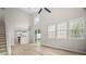 Spacious living room featuring an open layout, fireplace, and access to the kitchen at 612 Windcroft Nw Cir, Acworth, GA 30101