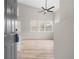 Open-concept living room featuring vaulted ceilings, fireplace and wood floors at 612 Windcroft Nw Cir, Acworth, GA 30101