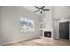 Living room featuring fireplace, vaulted ceiling and plenty of light at 612 Windcroft Nw Cir, Acworth, GA 30101