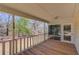 Spacious porch perfect for relaxing with a view of the yard and trees at 692 W Union Grove Cir, Auburn, GA 30011