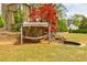 Backyard retreat with koi pond, hammock, and lush greenery at 717 Robinson Farms Dr, Marietta, GA 30068