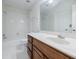 This bright bathroom is equipped with a tub, and vanity with a sink at 717 Robinson Farms Dr, Marietta, GA 30068