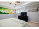 Bedroom featuring a black dresser and wall art at 717 Robinson Farms Dr, Marietta, GA 30068