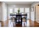 Cozy dining area with ample natural light and a view of the backyard at 717 Robinson Farms Dr, Marietta, GA 30068