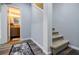Hallway with plush carpet on the stairs leading to the lower level and a bathroom at 717 Robinson Farms Dr, Marietta, GA 30068