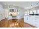 Open kitchen and dining area with a coffee station and custom cabinetry at 717 Robinson Farms Dr, Marietta, GA 30068