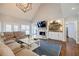 Inviting living room with vaulted ceilings and a cozy fireplace at 717 Robinson Farms Dr, Marietta, GA 30068