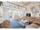 Bright living room featuring a soaring ceiling, second-story overlook, and a cozy sectional sofa at 717 Robinson Farms Dr, Marietta, GA 30068