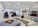 The living room features a large sectional sofa, TV, and a classic arcade game at 717 Robinson Farms Dr, Marietta, GA 30068