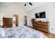 Spacious main bedroom with a large entertainment center and en-suite bathroom entrance at 717 Robinson Farms Dr, Marietta, GA 30068