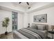 Neutral toned bedroom featuring a large window with natural light at 1100 Howell Mill Nw Rd # 408, Atlanta, GA 30318