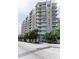 Apartment building exterior showcasing multi-level balconies and street view at 1100 Howell Mill Nw Rd # 408, Atlanta, GA 30318