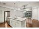Open concept kitchen featuring an island and stainless steel appliances at 1100 Howell Mill Nw Rd # 408, Atlanta, GA 30318