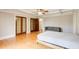 Bedroom with hardwood floors, double doors, and a neutral color scheme at 120 Maryeanna Ne Dr, Atlanta, GA 30342