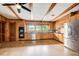 The kitchen features wood cabinets, stainless steel appliances, and decorative ceiling beams at 120 Maryeanna Ne Dr, Atlanta, GA 30342