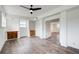 Basement living room with wood-look flooring and built in cabinetry at 120 Maryeanna Ne Dr, Atlanta, GA 30342