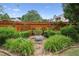 The backyard features a beautiful garden, providing a private outdoor retreat at 1239 Bonshaw Trl, Marietta, GA 30064