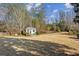 Beautiful backyard featuring a well-maintained lawn and a cute backyard garden at 1239 Bonshaw Trl, Marietta, GA 30064