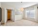 Inviting bedroom features a large window, bi-fold closet and ample natural light for a serene retreat at 1239 Bonshaw Trl, Marietta, GA 30064