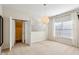 Bedroom with closet, window, carpet and hanging decorative light at 1239 Bonshaw Trl, Marietta, GA 30064