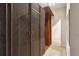 Walk-in closet featuring custom wood cabinets, shelves, and ample storage space at 1239 Bonshaw Trl, Marietta, GA 30064