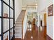 Open foyer with hardwood floors and staircase at 1239 Bonshaw Trl, Marietta, GA 30064