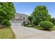 Beautiful brick home with a well-manicured lawn, a two-car garage, and charming curb appeal at 1239 Bonshaw Trl, Marietta, GA 30064
