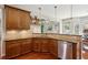 Stylish kitchen with granite counters, stainless steel appliances, and custom cabinets at 1239 Bonshaw Trl, Marietta, GA 30064