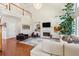 Open living room design with a fireplace, TV, and comfortable seating at 1239 Bonshaw Trl, Marietta, GA 30064