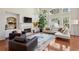 Spacious living room features a fireplace, built-in shelving, and large windows at 1239 Bonshaw Trl, Marietta, GA 30064