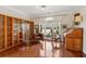 Home office with custom built-ins, hardwood floors, and natural light at 1239 Bonshaw Trl, Marietta, GA 30064